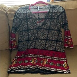 Flowing, bell sleeved top